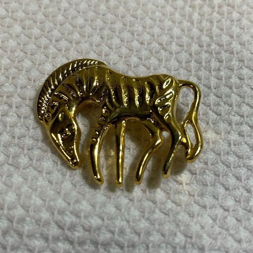 Vintage gold tone zebra brooch